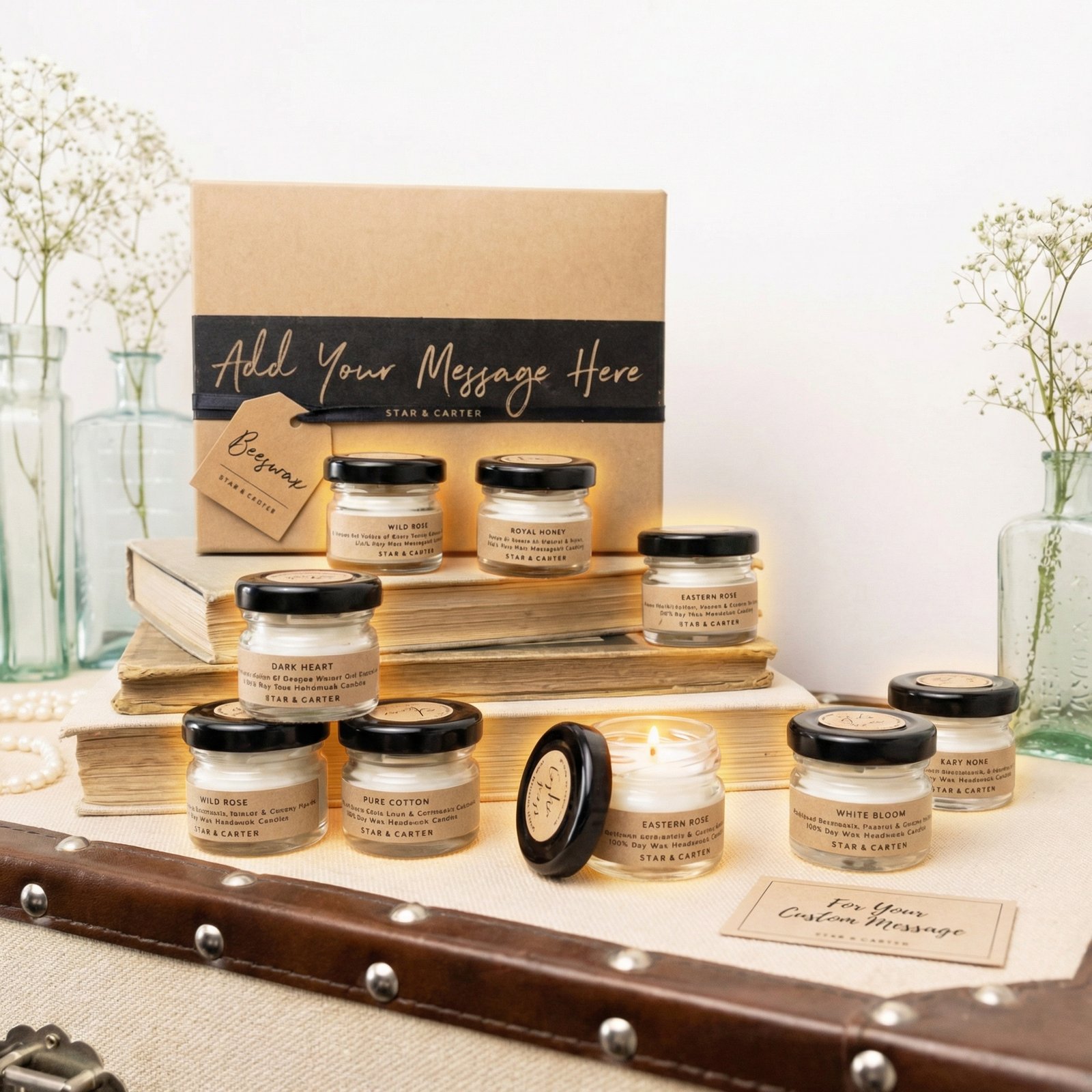 Beeswax candle jars arranged on vintage books display